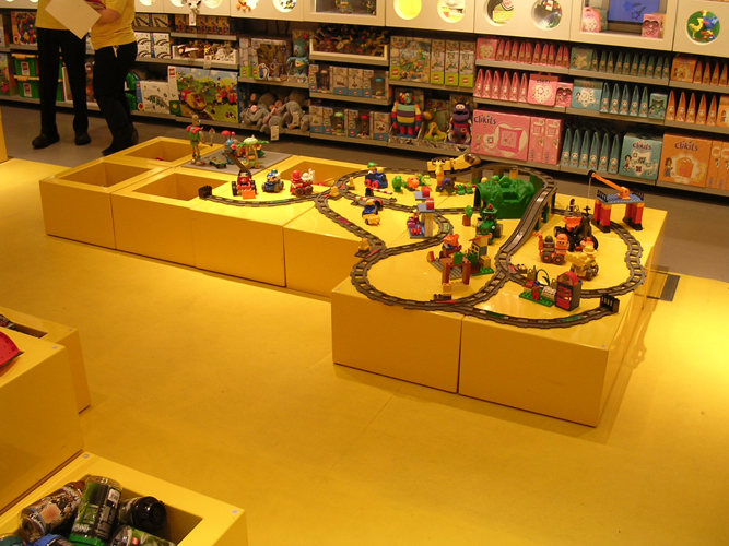Yellow Retail display stands made from GRP